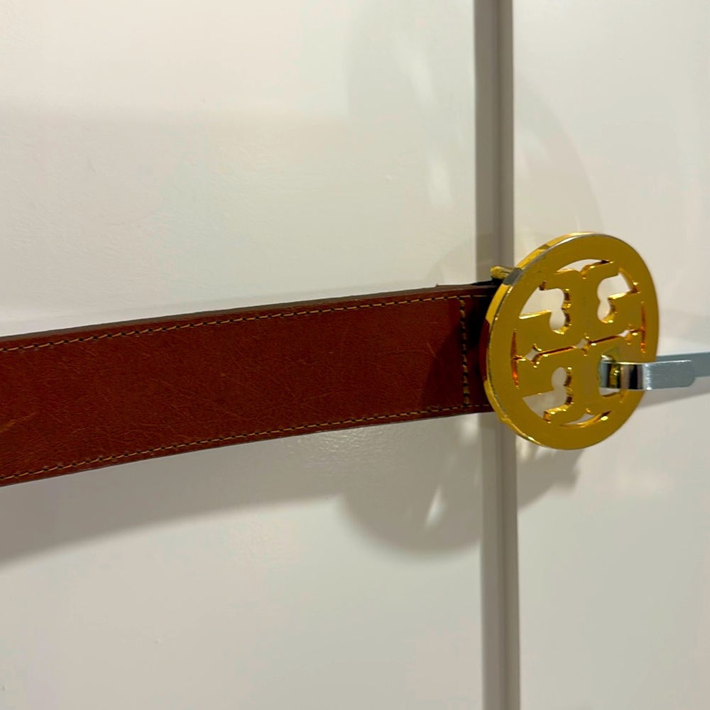 Tory Burch gold/cognac logo belt.  Size medium.